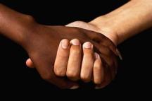 335992284_interracial_hands_xlarge