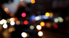 stock-footage-defocused-car-lights-at-night